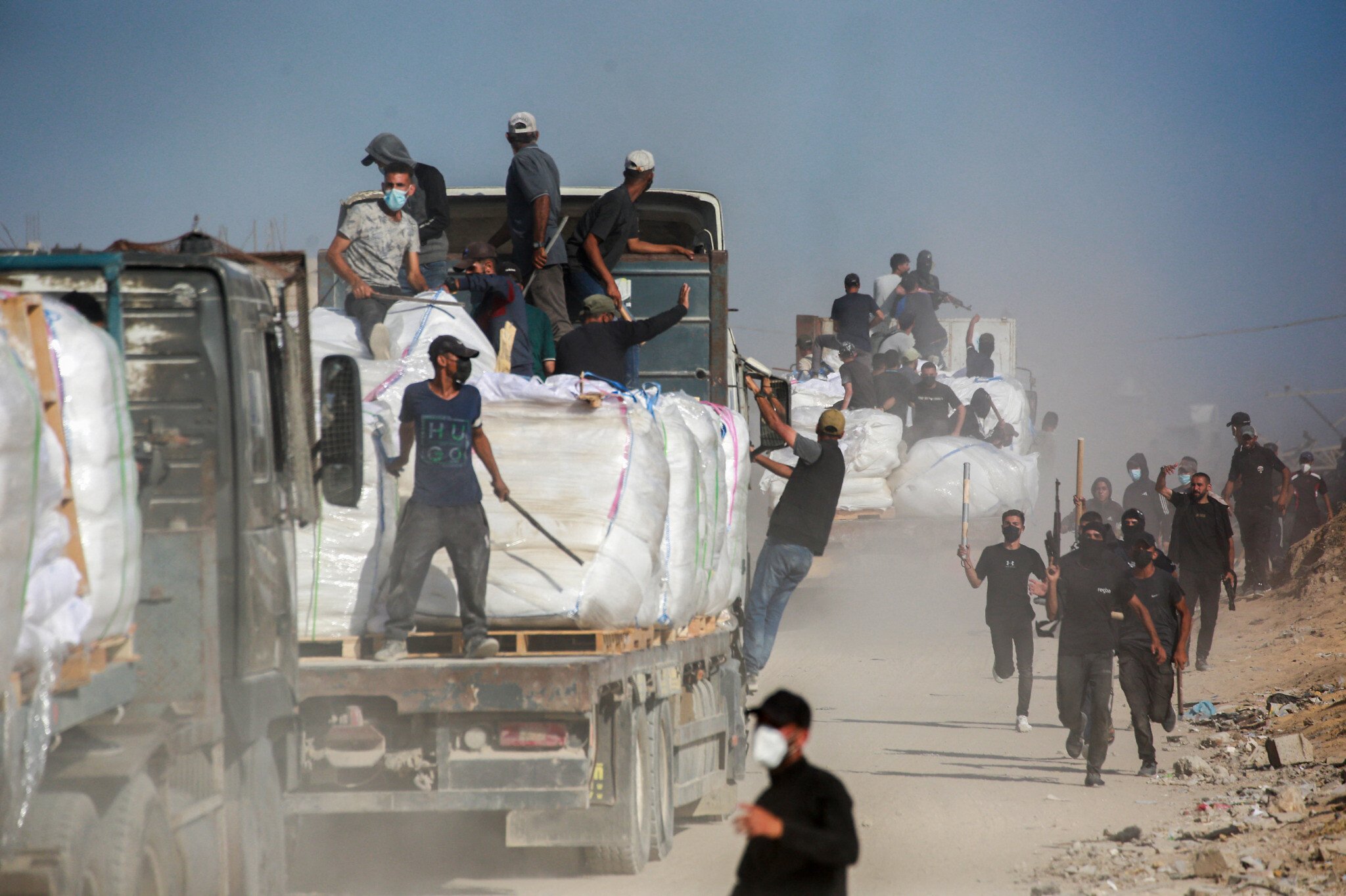 Gaza clans deny Hamas is stealing aid after Israel partially halts deliveries