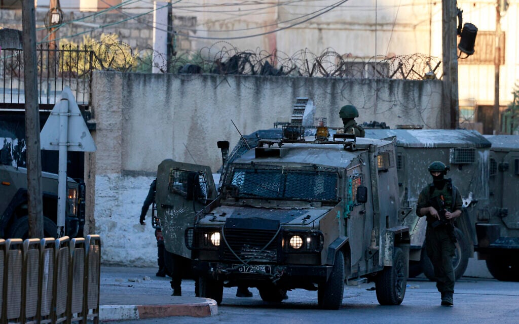 Israeli forces deploy around Joseph's Tomb in Nablus on June 27, 2025, after a group of Israelis entered the site without coordination and clashed with Palestinian residents. (Jaafar Ashtiyeh/AFP)