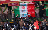 Mourners attend the funeral procession of Iranian military commanders and scientists killed during Israeli strikes at Enghelab (Revolution) Square in the capital Tehran on June 28, 2025. (ATTA KENARE / AFP)