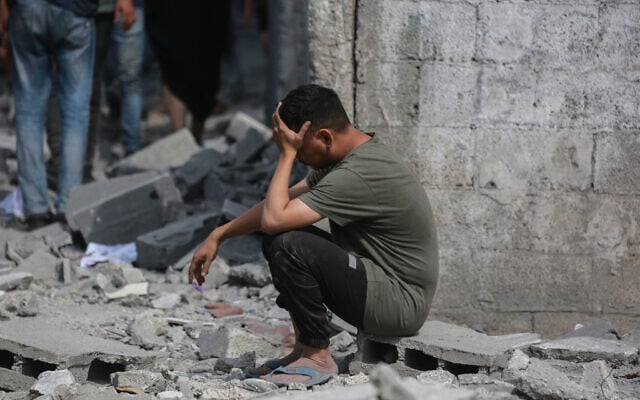 A Palestinian man sits near the rubble of a building that was hit in overnight Israeli strikes in Jabalia in the northern Gaza Strip, on June 30, 2025,(Photo by Bashar TALEB / AFP) A Palestinian man sits near the rubble of a building that was hit in overnight Israeli strikes in Jabalia in the northern Gaza Strip, on June 30, 2025,(Photo by Bashar TALEB / AFP)