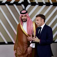 French President Emmanuel Macron, right, speaks with Saudi Arabia's Prime Minister and Crown Prince Mohammed bin Salman bin Abdulaziz Al Saud prior to a group photo at an EU-Gulf Cooperation Council meeting in Brussels, Belgium, Wednesday, Oct. 16, 2024. (AP Photo/Omar Havana)