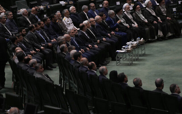Iranian top officials attend a memorial at the parliament in Tehran, Iran, Wednesday, May 21, 2025, for the late President Ebrahim Raisi and several officials, who were killed in a helicopter crash in the country's northwest last year. (AP Photo/Vahid Salemi) Iranian top officials attend a memorial at the parliament in Tehran, Iran, Wednesday, May 21, 2025, for the late President Ebrahim Raisi and several officials, who were killed in a helicopter crash in the country's northwest last year. (AP Photo/Vahid Salemi)