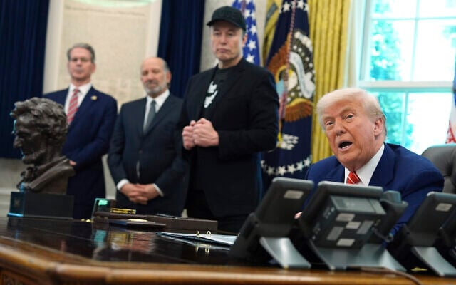 US President Donald Trump, from right, speaks during a news conference with Elon Musk as Commerce Secretary Howard Lutnick and Treasury Secretary Scott Bessent listen in the Oval Office of the White House, Friday, May 30, 2025, in Washington. (AP Photo/Evan Vucci) US President Donald Trump, from right, speaks during a news conference with Elon Musk as Commerce Secretary Howard Lutnick and Treasury Secretary Scott Bessent listen in the Oval Office of the White House, Friday, May 30, 2025, in Washington. (AP Photo/Evan Vucci)