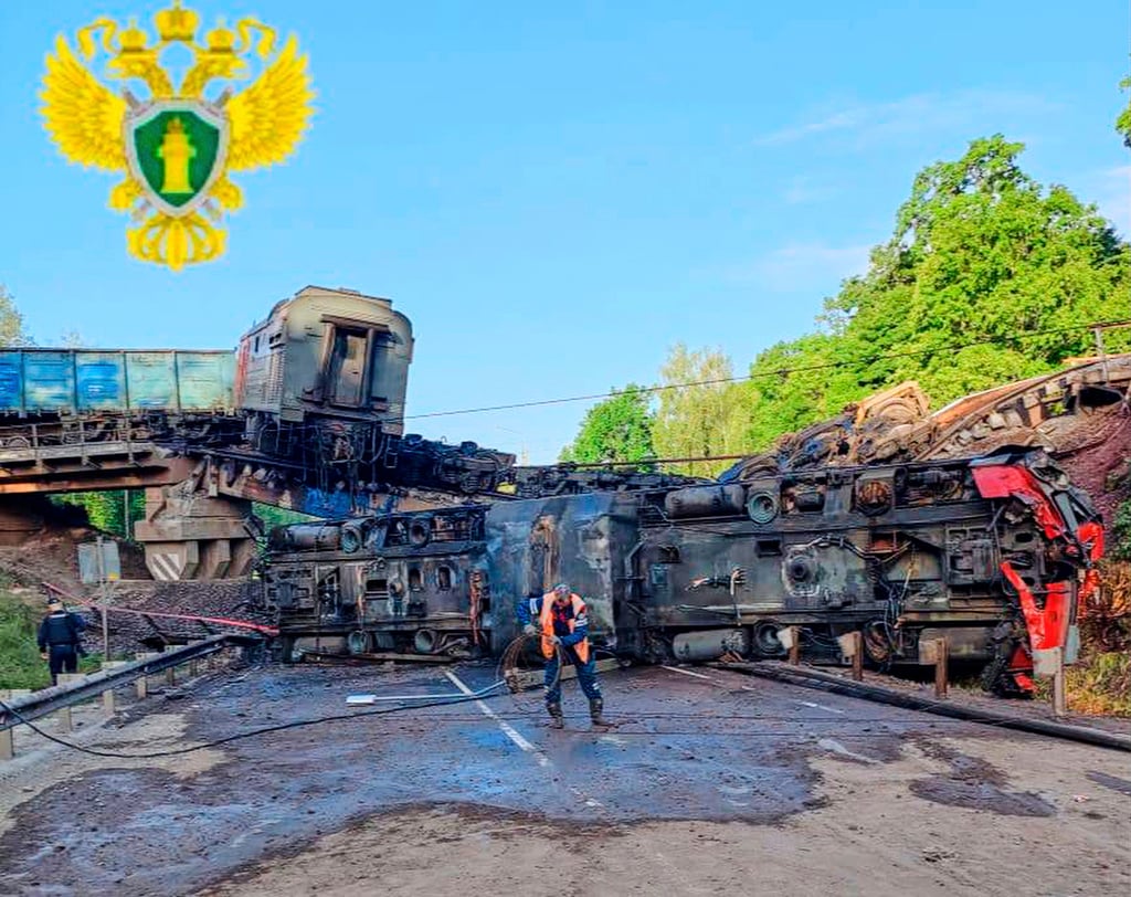 NextImg:Kiev says over 40 military aircraft destroyed in drone attack deep inside Russia