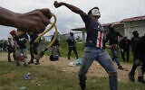 Anti-government protesters clash with police at the Indigenous Embera community of Arimae, Panama, Thursday, June 5, 2025. (AP Photo/Matias Delacroix)