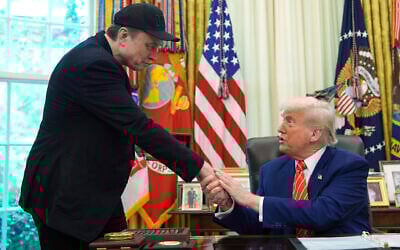 US President Donald Trump (right) shakes Elon Musk's hand in the Oval Office, Washington DC, May 30, 2025. (AP Photo/Evan Vucci)