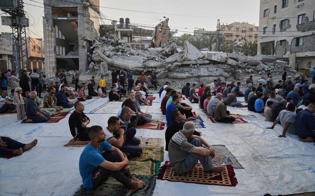 Gazans hold Eid prayers outdoors in the rubble, with scarce food: ‘The worst feast’