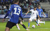 Israel's Dan Biton, second from right, scores his side's opening goal during the World Cup 2026 group I qualifying soccer match between Estonia and Israel at the A. Le Coq Arena stadium in Tallinn, Estonia, June 6, 2025. (AP Photo/Sergei Grits)
