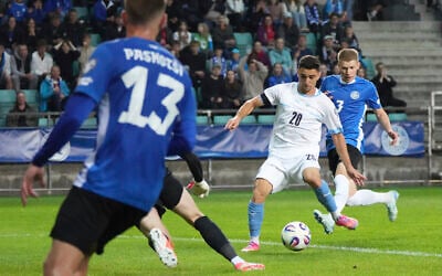 Israel's Dan Biton, second from right, scores his side's opening goal during the World Cup 2026 group I qualifying soccer match between Estonia and Israel at the A. Le Coq Arena stadium in Tallinn, Estonia, June 6, 2025. (AP Photo/Sergei Grits)