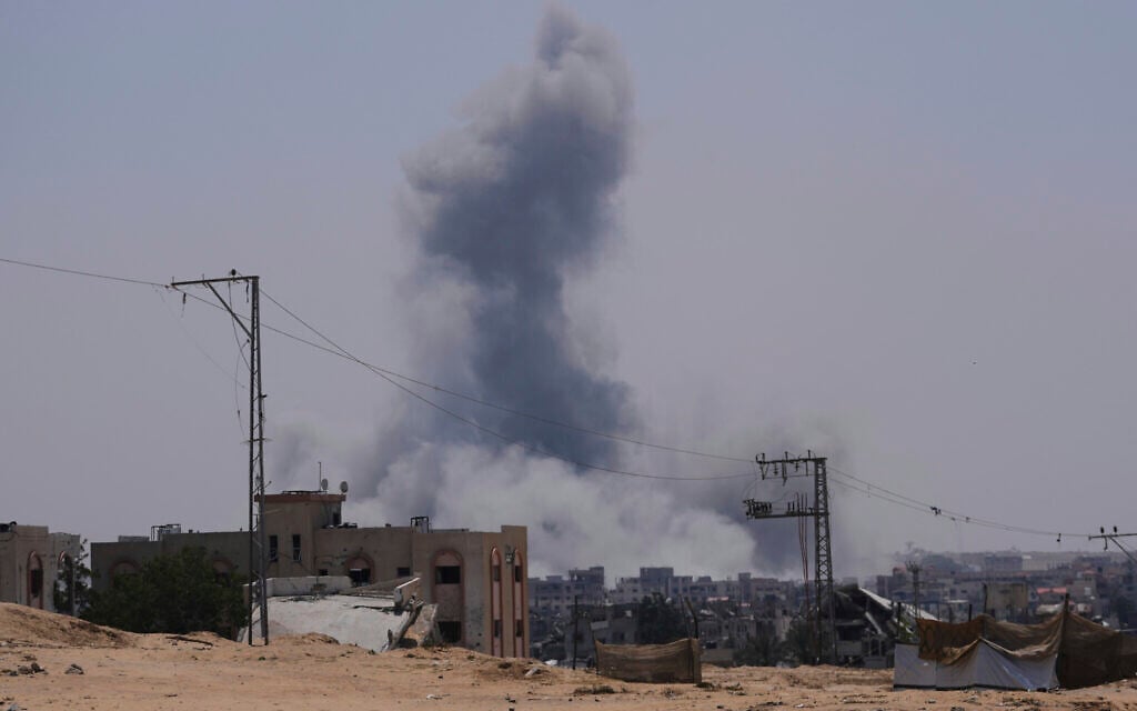 Smoke rises from an Israeli airstrike east of Khan Younis, in southern Gaza, June 8, 2025. (AP Photo/Abdel Kareem Hana)