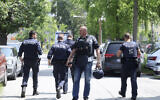 Police officers at the scene of a shooting at a school in Graz, Austria, June 10, 2025. (Kleine Zeitung via AP)