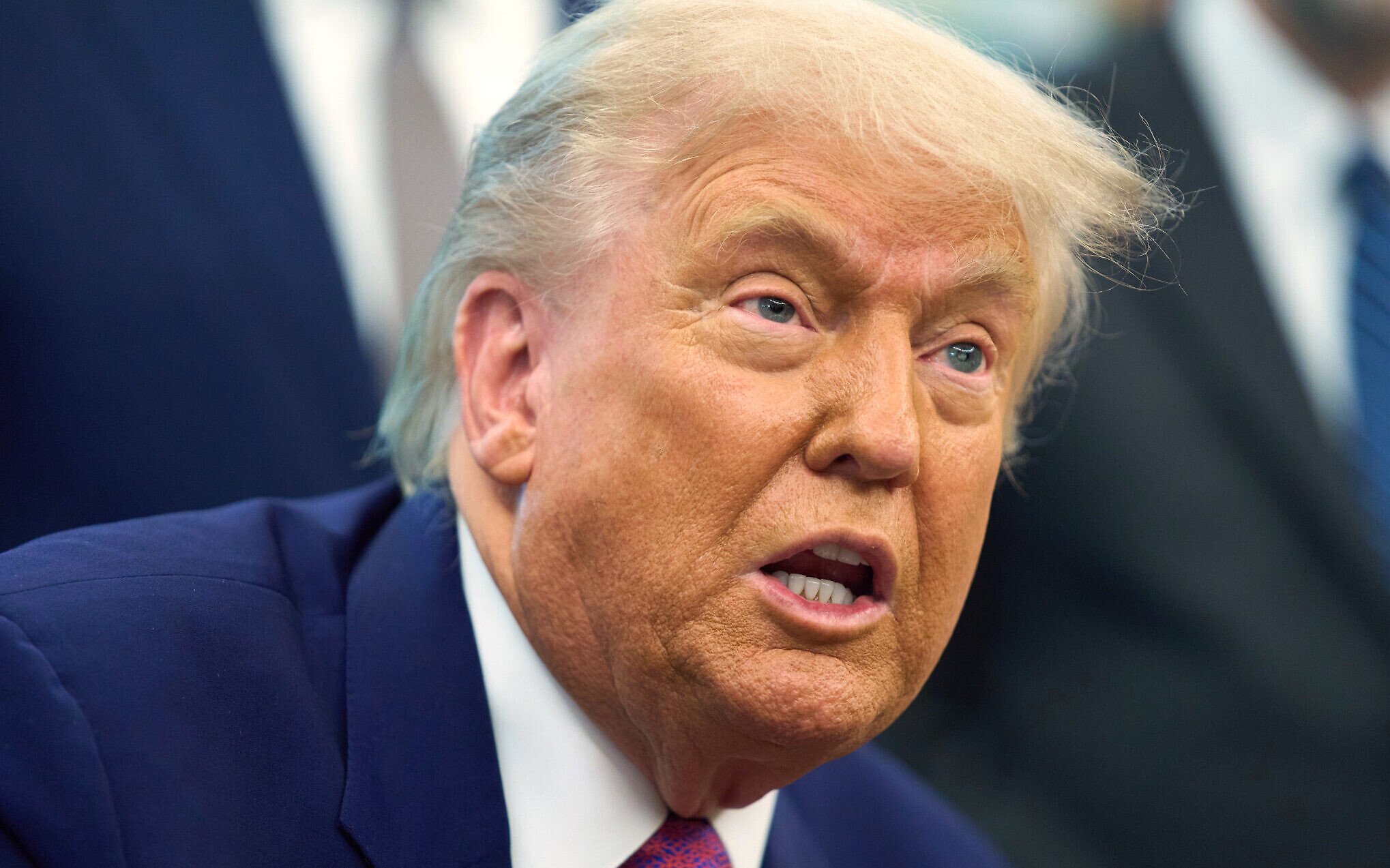 NextImg:Trump ‘less confident’ on Iran nuclear deal as Tehran warns against military action