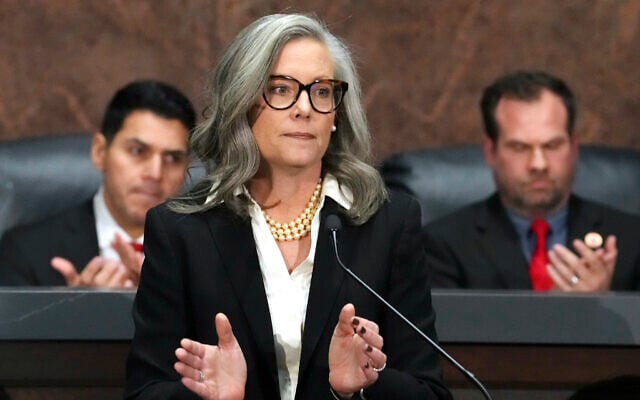 Arizona Democratic Gov. Katie Hobbs, center, applauds for those affected by the Los Angeles area wildfires as she gives the State of the State address in the House of Representatives at the state Capitol on Jan. 13, 2025, in Phoenix. (AP Photo/Ross D. Franklin, File) Arizona Democratic Gov. Katie Hobbs, center, applauds for those affected by the Los Angeles area wildfires as she gives the State of the State address in the House of Representatives at the state Capitol on Jan. 13, 2025, in Phoenix. (AP Photo/Ross D. Franklin, File)