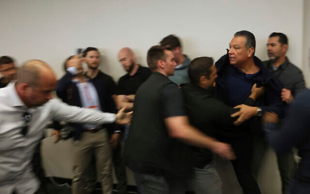US Senator Alex Padilla, a California Democrat, is pushed out of the room as Homeland Security Secretary Kristi Noem holds a news conference regarding the recent protests in Los Angeles on June 12, 2025. (AP Photo/Etienne Laurent) US Senator Alex Padilla, a California Democrat, is pushed out of the room as Homeland Security Secretary Kristi Noem holds a news conference regarding the recent protests in Los Angeles on June 12, 2025. (AP Photo/Etienne Laurent)