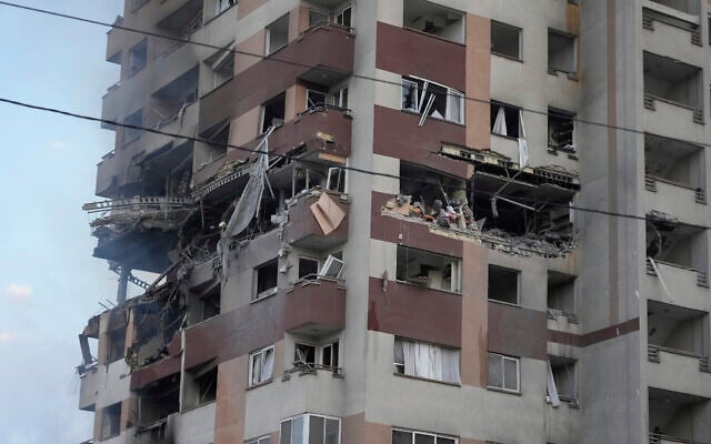 Damage is seen to an apartment building after Israeli strikes in Tehran, June 13, 2025. (AP Photo/Vahid Salemi)
