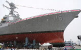 The future USS Thomas Hudner, a US Navy destroyer named after Korean War veteran Thomas Hudner, during christening ceremony at Bath Iron Works in Bath, Maine,  April 1, 2017. (AP Photo/Mary Schwalm, File)