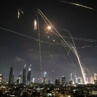 Israeli air defense system fires to intercept Iranian missiles over Tel Aviv, Israel, Friday, June 13, 2025. (AP/Leo Correa)