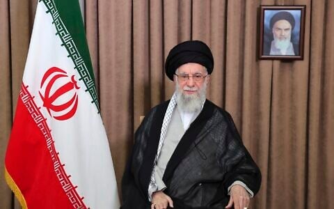 This photo released by an official website of the office of the Iranian supreme leader, shows Supreme Leader Ayatollah Ali Khamenei in a televised speech, under a portrait of the late revolutionary founder Ayatollah Khomeini, Friday, June 13, 2025. (Office of the Iranian Supreme Leader via AP)