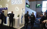 Riot police officers patrol by the Israeli pavilions at the Paris Air Show, June 16, 2025 in Le Bourget, north of Paris. (AP Photo/Michel Euler)