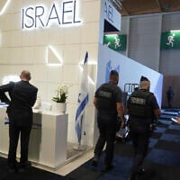 Riot police officers patrol by the Israeli pavilions at the Paris Air Show, June 16, 2025 in Le Bourget, north of Paris. (AP Photo/Michel Euler)