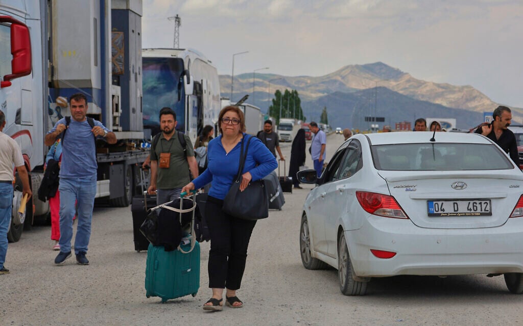 Bumper-to-bumper traffic on roads out of Tehran as residents flee Israeli strikes