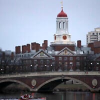 Rowers paddle down the Charles River near the campus of Harvard University in Cambridge, Massachusetts, March 7, 2017. (AP Photo/Charles Krupa, File)