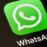 FILE - A WhatsApp icon is displayed on an iPhone, November 15, 2018, in Gelsenkirchen, Germany. (AP Photo/Martin Meissner, File)