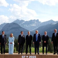 Leaders pose for a photo during the G7 Summit, in Kananaskis, Alberta, Monday, June 16, 2025. (Suzanne Plunkett/Pool Photo via AP)
