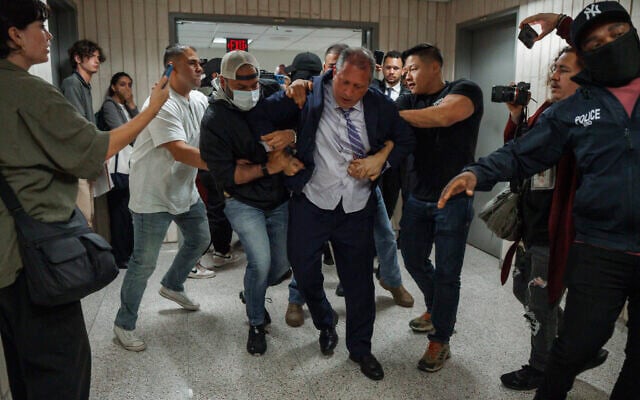 New York City Comptroller Brad Lander is placed under arrest by Immigration and Customs Enforcement (ICE) and FBI agents outside federal immigration court, June 17, 2025, in New York. (AP/Olga Fedorova) New York City Comptroller Brad Lander is placed under arrest by Immigration and Customs Enforcement (ICE) and FBI agents outside federal immigration court, June 17, 2025, in New York. (AP/Olga Fedorova)