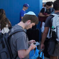 Evacuees from Israel arrive at the port of Larnaca, Cyprus, June 18, 2025. (AP Photo/Petros Karadjias)