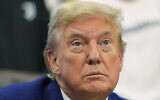 US President Donald Trump speaks with reporters as he meets with members of the Juventus soccer club in the Oval Office of the White House, June 18, 2025, in Washington. (AP Photo/Alex Brandon)