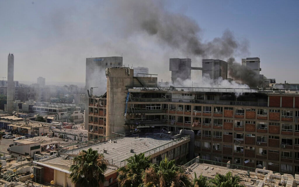 Smoke rises from a building of the Soroka hospital complex in Beersheba after it was hit by a missile fired from Iran, June 19, 2025. (AP Photo/Leo Correa)