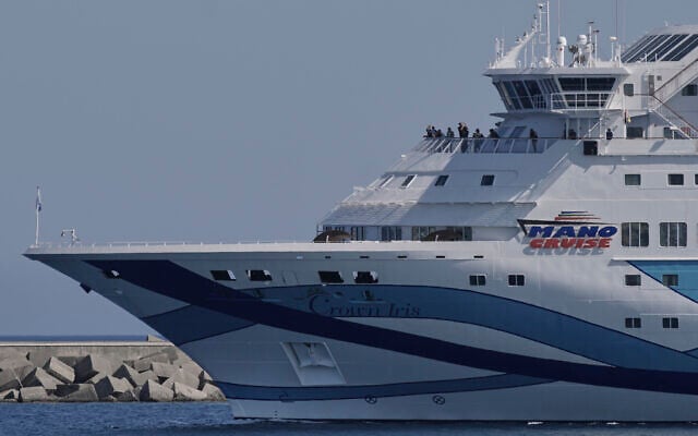 The cruise ship Crown Iris carrying thousands of stranded Israeli citizens back to Israel departs from Cyprus' main Limassol port on, June 19, 2025. (AP Photo/Petros Karadjias)