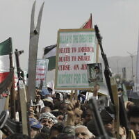 Houthi supporters shout slogans during an anti-US and anti-Israel weekly rally in Sanaa, Yemen, June 20, 2025. (AP Photo/Osamah Abdulrahman)