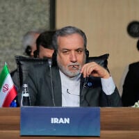 Iranian Foreign Minister Abbas Araghchi listens to speeches as he attends the Council of Foreign Ministers of the Organization of Islamic Cooperation meeting, in Istanbul, Turkey, June 21, 2025. (AP Photo/Khalil Hamra)