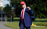 US President Donald Trump walks on the South Lawn upon arriving at the White House, Saturday, June 21, 2025, in Washington. (AP Photo/Jose Luis Magana)