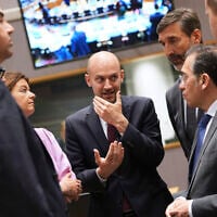French Foreign Minister Jean-Noel Barrot, center, speaks with, from left, Malta's Foreign Minister Ian Borg, Slovenia's Foreign Minister Tanja Fajon, Slovakia's Foreign Minister Juraj Blanar and Spain's Foreign Minister Jose Manuel Albares Bueno during a meeting of EU foreign ministers at the European Council building in Brussels, Belgium, June 23, 2025. (AP Photo/Virginia Mayo)