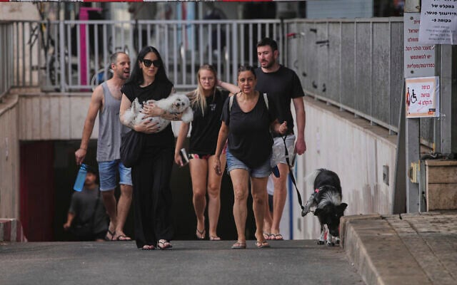 People leave an underground parking garage where they took shelter after an air raid alarm of Iranian missile attacks in Tel Aviv, Israel, June 24, 2025. (AP Photo/Ohad Zwigenberg) People leave an underground parking garage where they took shelter after an air raid alarm of Iranian missile attacks in Tel Aviv, Israel, June 24, 2025. (AP Photo/Ohad Zwigenberg)