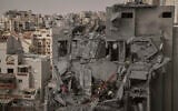 Israeli soldiers and rescue team work amid the rubble of residential buildings destroyed by an Iranian missile strike that killed several people, in Beersheba, Israel, June 24, 2025. (AP Photo/Leo Correa)