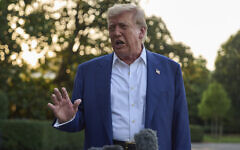 US President Donald Trump speaks with reporters before boarding Marine One on the South Lawn of the White House, June 24, 2025, in Washington. (AP Photo/Evan Vucci)