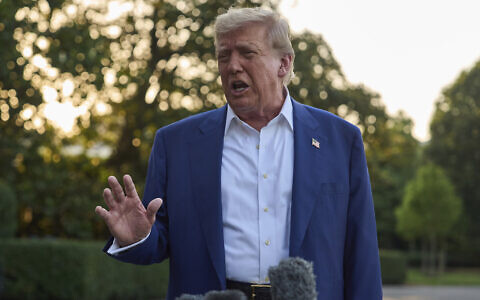 US President Donald Trump speaks with reporters before boarding Marine One on the South Lawn of the White House, June 24, 2025, in Washington. (AP Photo/Evan Vucci)