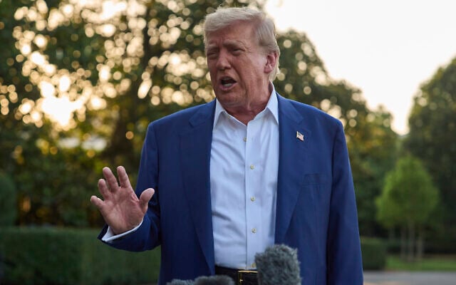 US President Donald Trump speaks with reporters before boarding Marine One on the South Lawn of the White House, June 24, 2025, in Washington. (AP Photo/Evan Vucci)