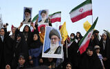 Iranian protesters hold their country's flags and posters of Supreme Leader Ayatollah Ali Khamenei at an anti-US and anti-Israeli rally at Enqelab-e-Eslami (Islamic Revolution) square in downtown Tehran, Iran, June 24, 2025. (Vahid Salemi/AP)