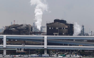 Smoke billows from an oil refinery in Kawasaki, southwest of Tokyo, Japan, October 21, 2013. (AP Photo/Koji Sasahara, File)