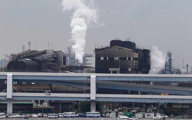 Smoke billows from an oil refinery in Kawasaki, southwest of Tokyo, Japan, October 21, 2013. (AP Photo/Koji Sasahara, File)