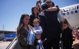 New Jewish immigrants from Spain, England, France and the Netherlands disembark from an airplane a day after the announcement of a ceasefire between Israel and Iran, as they arrive at Ben Gurion International Airport, near Tel Aviv, June 25, 2025. (AP Photo/Ohad Zwigenberg)