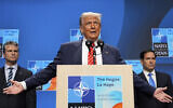 US President Donald Trump speaks at the end of the NATO summit, flanked by Secretary of State Marco Rubio, right, and Defense Secretary Pete Hegseth in The Hague, Netherlands, on June 25, 2025. (AP Photo/Alex Brandon)