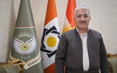 Khalil Naderi, spokesperson for the Kurdistan Freedom Party, or PAK, a separatist Iranian Kurdish group based in Iraq, poses for a portrait at a party office in an undisclosed location in Iraq's Irbil governorate, June 21, 2025. (AP Photo/Rashid Yahya)