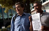 Ivo Herzog, left, son of journalist Vladimir Herzog who was killed in 1975 during the military dictatorship, accompanies Congressman Romario in Rio de Janeiro, April 1, 2013. (AP/Felipe Dana)