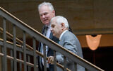 Democratic Senator Tim Kaine of Virginia, left, and Democratic Senator Jack Reed of Rhode Island, right, depart following a classified briefing on President Donald Trump's directed strikes on Iranian nuclear facilities last weekend, at the US Capitol in Washington, June 26, 2025. (AP Photo/Rod Lamkey, Jr.)